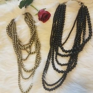 2 Classic pearl necklaces in black and gold